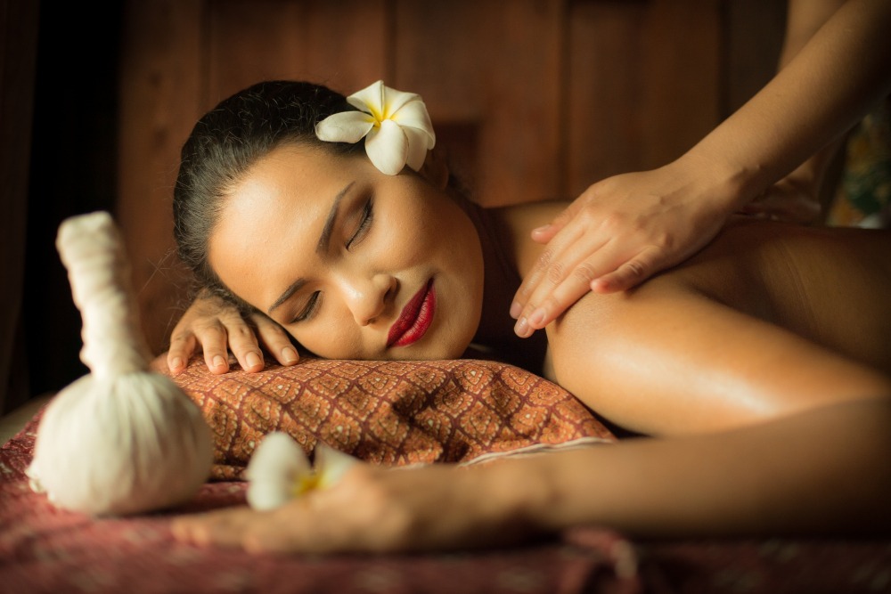 woman-getting-thai-massage-from-another-person